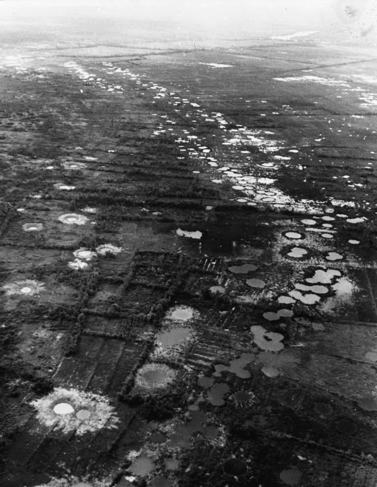 During Operation Rolling Thunder, U.S. planes carpeted the Vietnam landscape with "dumb bombs," which were dropped in a string, or “train.”&nbsp;Photo interpreters counting bomb craters and measuring distances derived their accuracy.&nbsp;